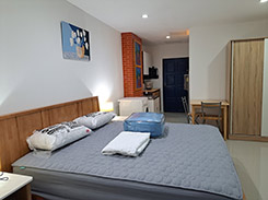 Wooden bed in the room